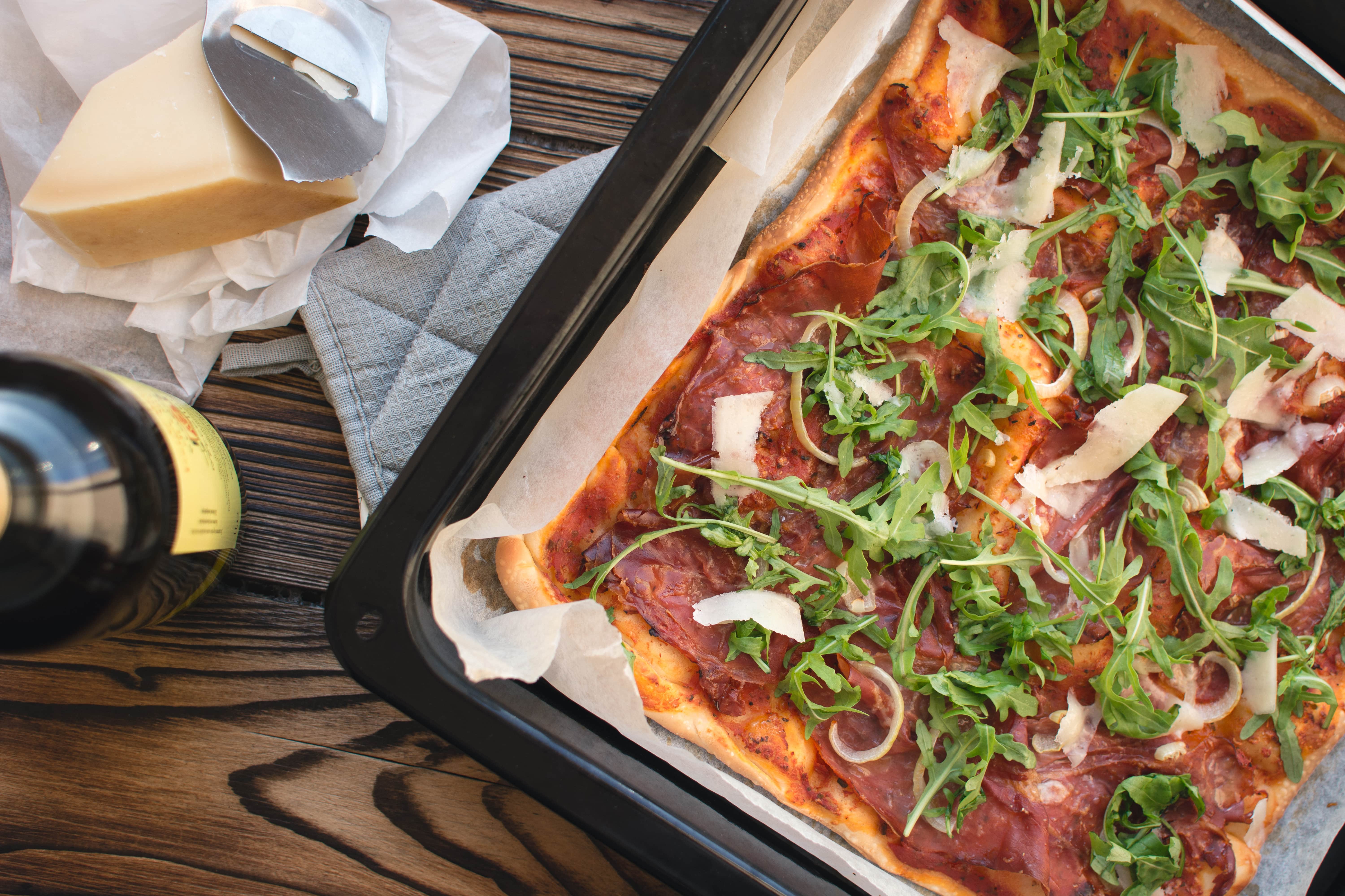 Pizza with mushrooms and greens 